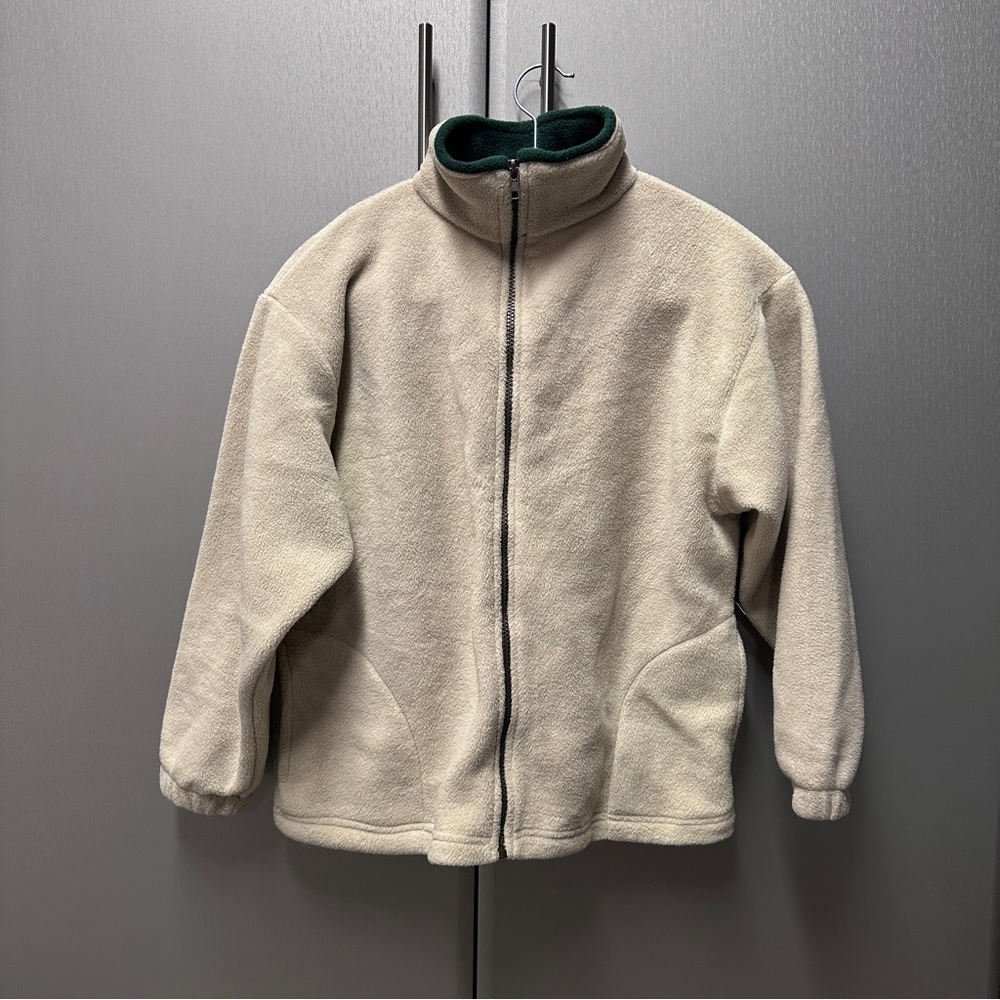 Cozy Cream Jacket with High Collar and Relaxed Fit
